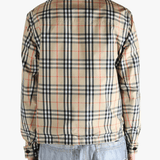Yellow  jacket worn by a person, showing the  jacket's fit