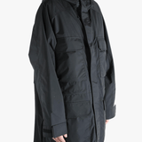Black jacket worn by a person, showing the jacket's fit