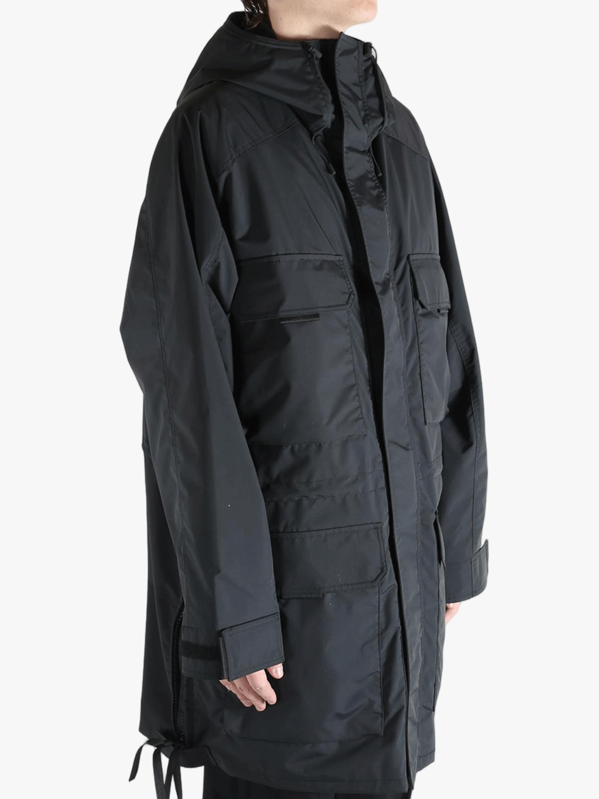 Black jacket worn by a person, showing the jacket's fit