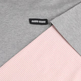 Close up of Grey shirt, showing texture of the 100% cotton fabric