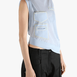 Blue vest worn by a person, showing the loose fit.