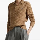 Brown knitwear worn by a person, showing the knitwear fit