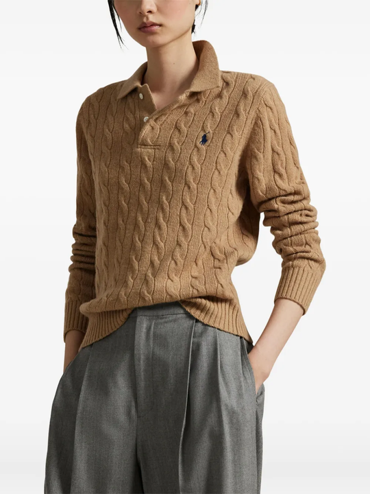 Brown knitwear worn by a person, showing the knitwear fit
