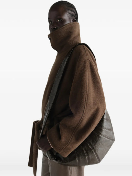 Brown bag worn by a person, showing the bag fit