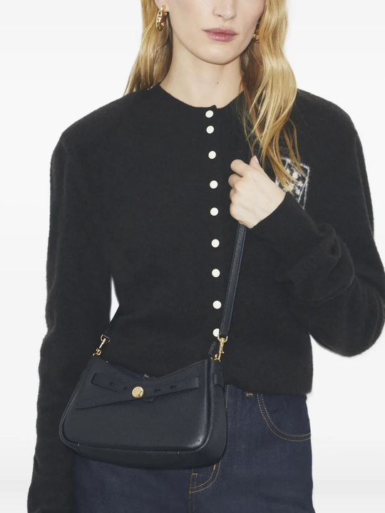 black bag worn by a person, showing the bag fit