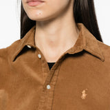 Brown shirt worn by a person, showing the shirt fit