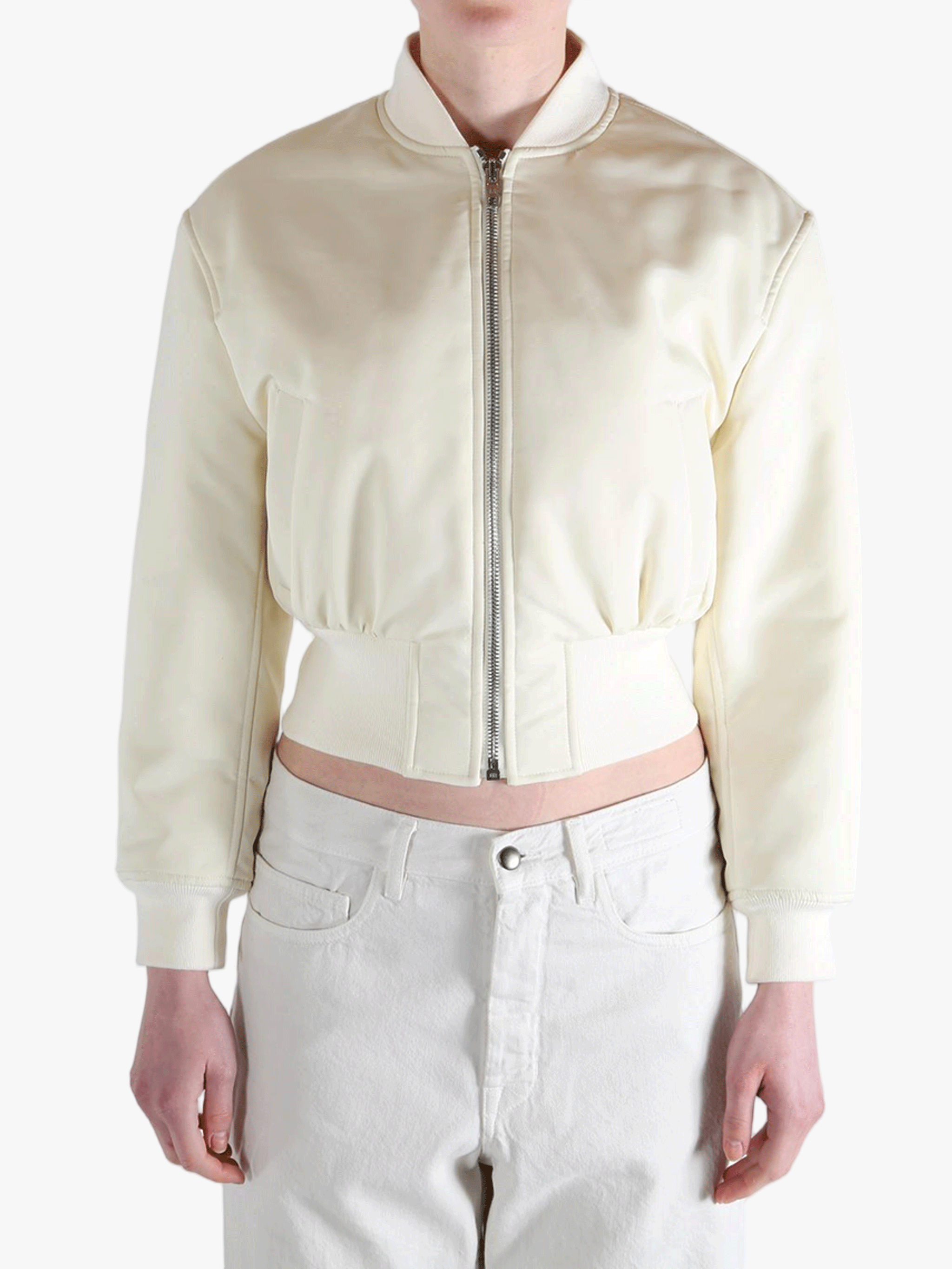 White jackets worn by a person, showing the jackets fit