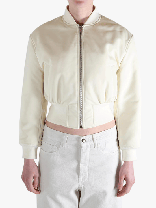 White jackets worn by a person, showing the jackets fit