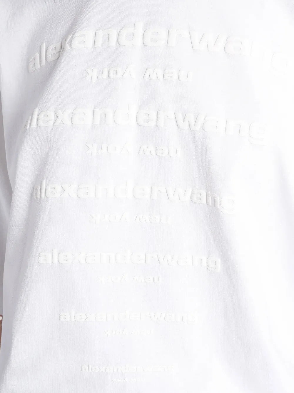 Close up of White t-shirt, showing texture of the 99% cotton/ 1% elastane fabric