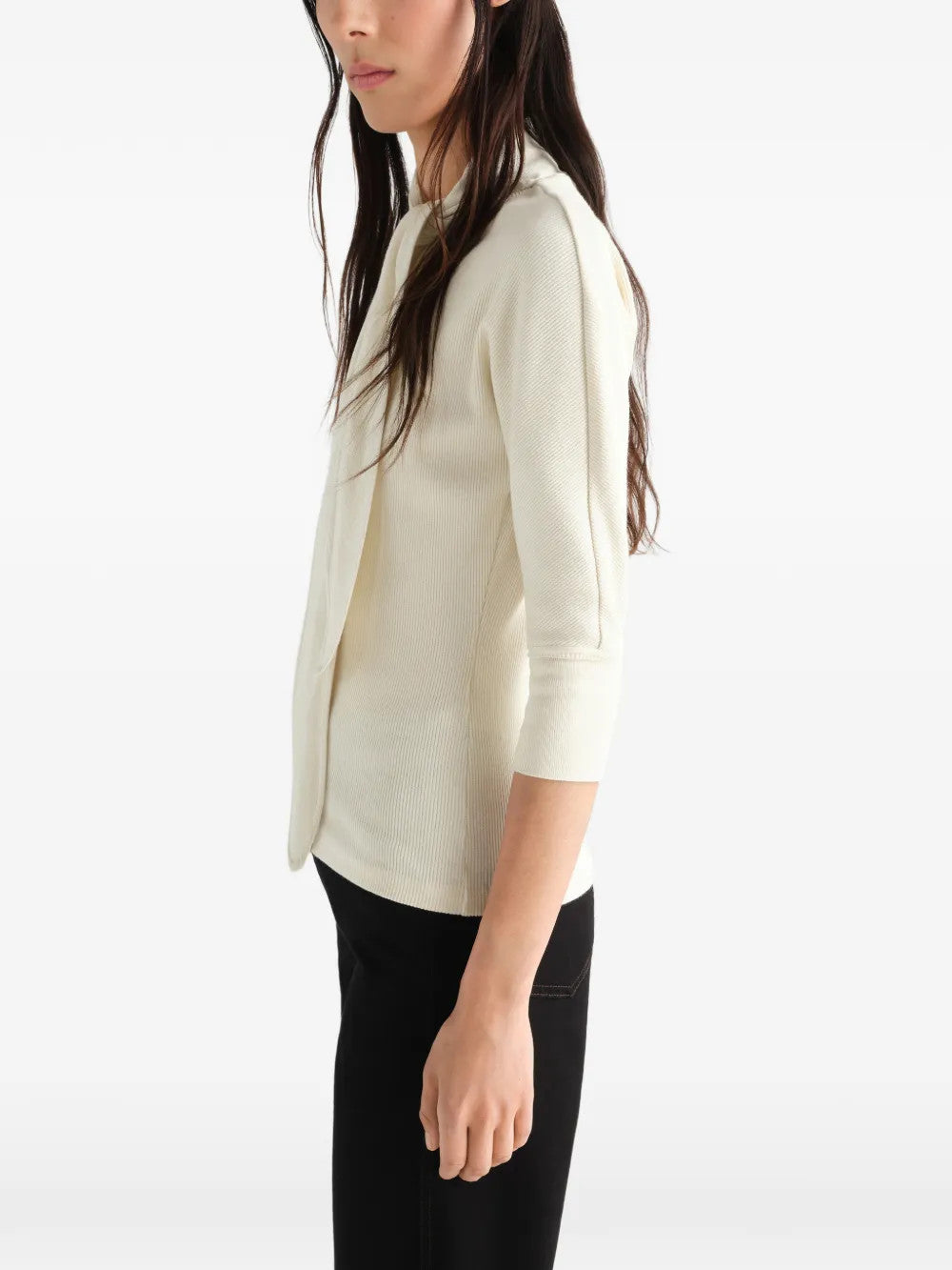 Tan t-shirt worn by a person, showing the t-shirt fit