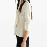 Tan t-shirt worn by a person, showing the t-shirt fit