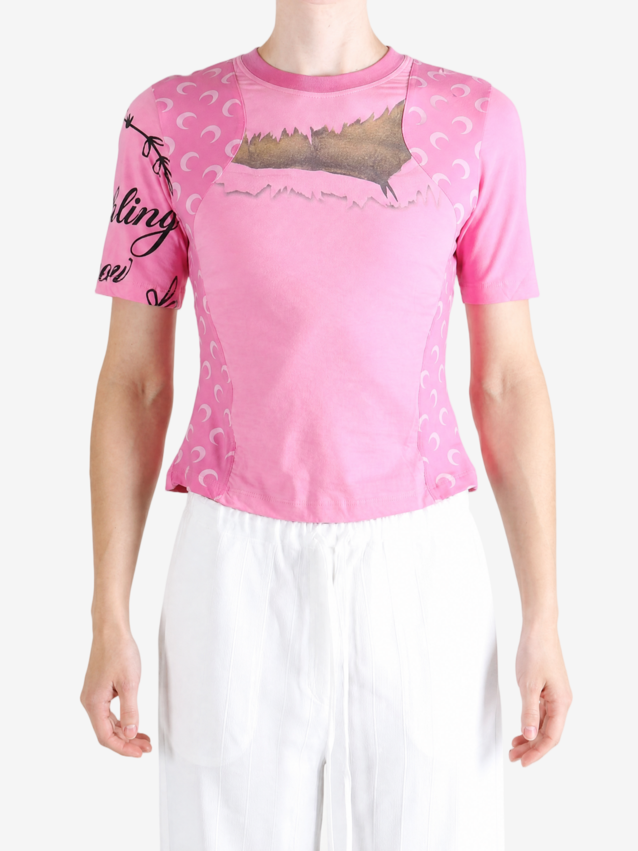 Pink t-shirt worn by a person, showing the t-shirt fit