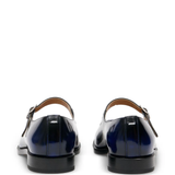 Black derbys, back view