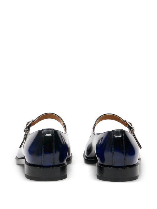 Black derbys, back view
