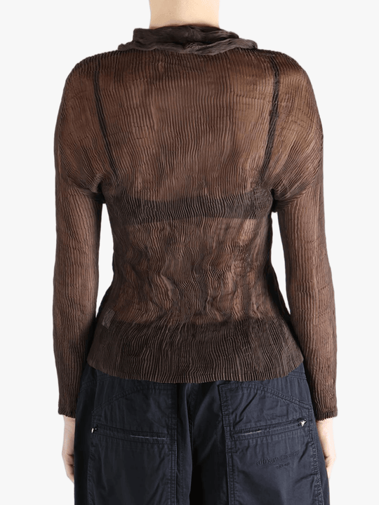 Brown shirt worn by a person, showing the shirt fit