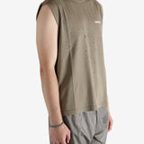 Brown shirt worn by a person, showing the shirt fit