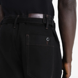 Close up of black pant, showing texture of the Cotton fabric