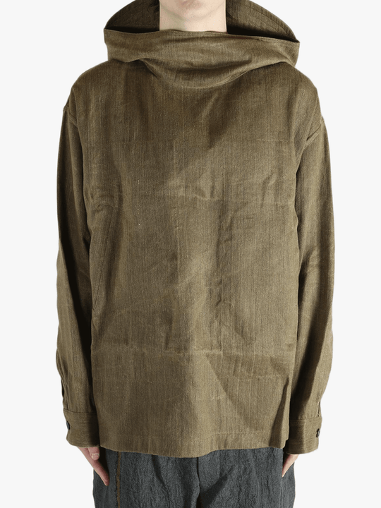 Brown jacket worn by a person, showing the jacket's fit