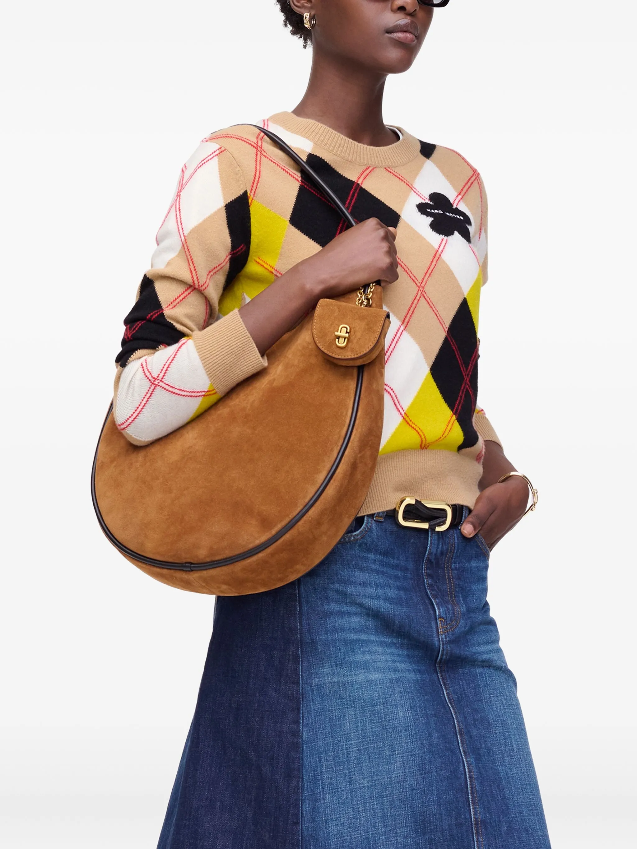 Yellow bag worn by a person, showing the bag's fit