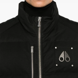 Black jacket worn by a person, showing the jacket fit