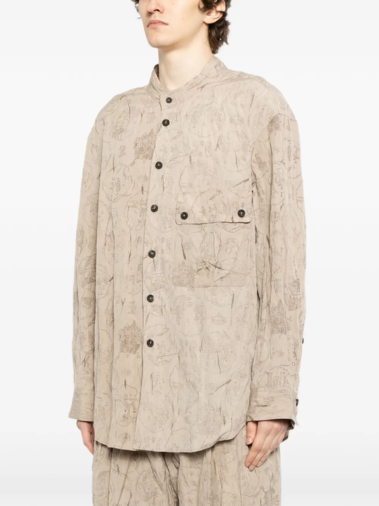 Tan shirt worn by a person, showing the shirt's fit