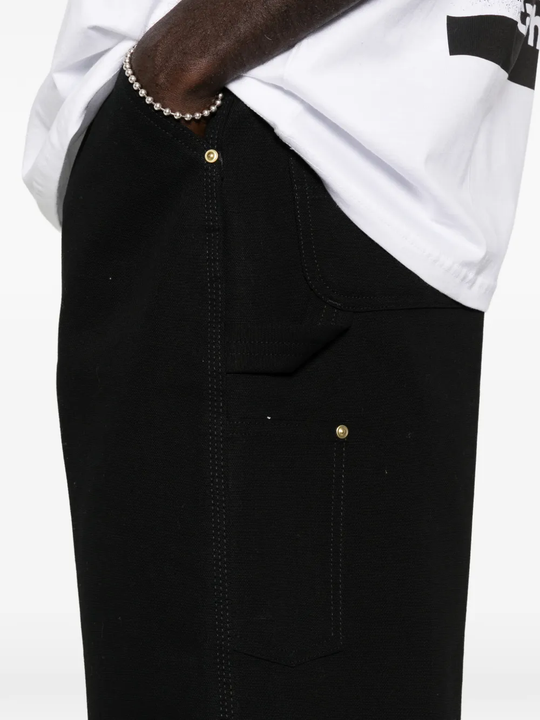 Close up of black short, showing texture of the Polyester fabric