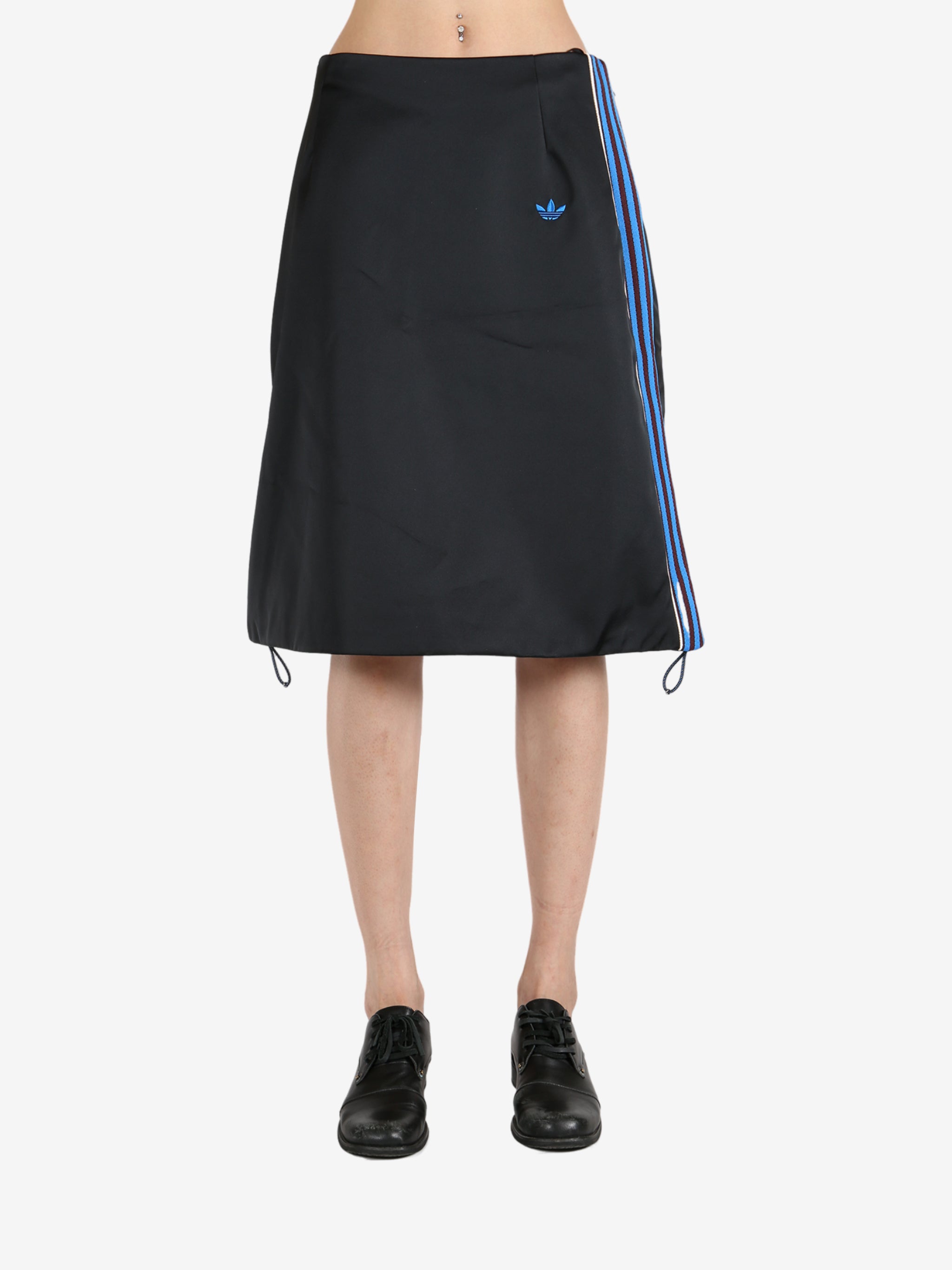 Black skirt worn by a person, showing the skirt 's fit