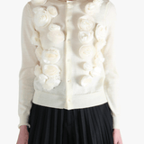 White jacket worn by a person, showing the jacket's fit