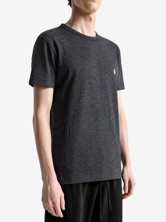 Grey t-shirt worn by a person, showing the t-shirt fit