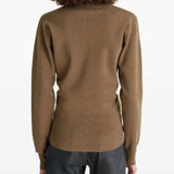 Brown knitwear worn by a person, showing the knitwear's fit