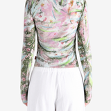 Pink top worn by a person, showing the top fit