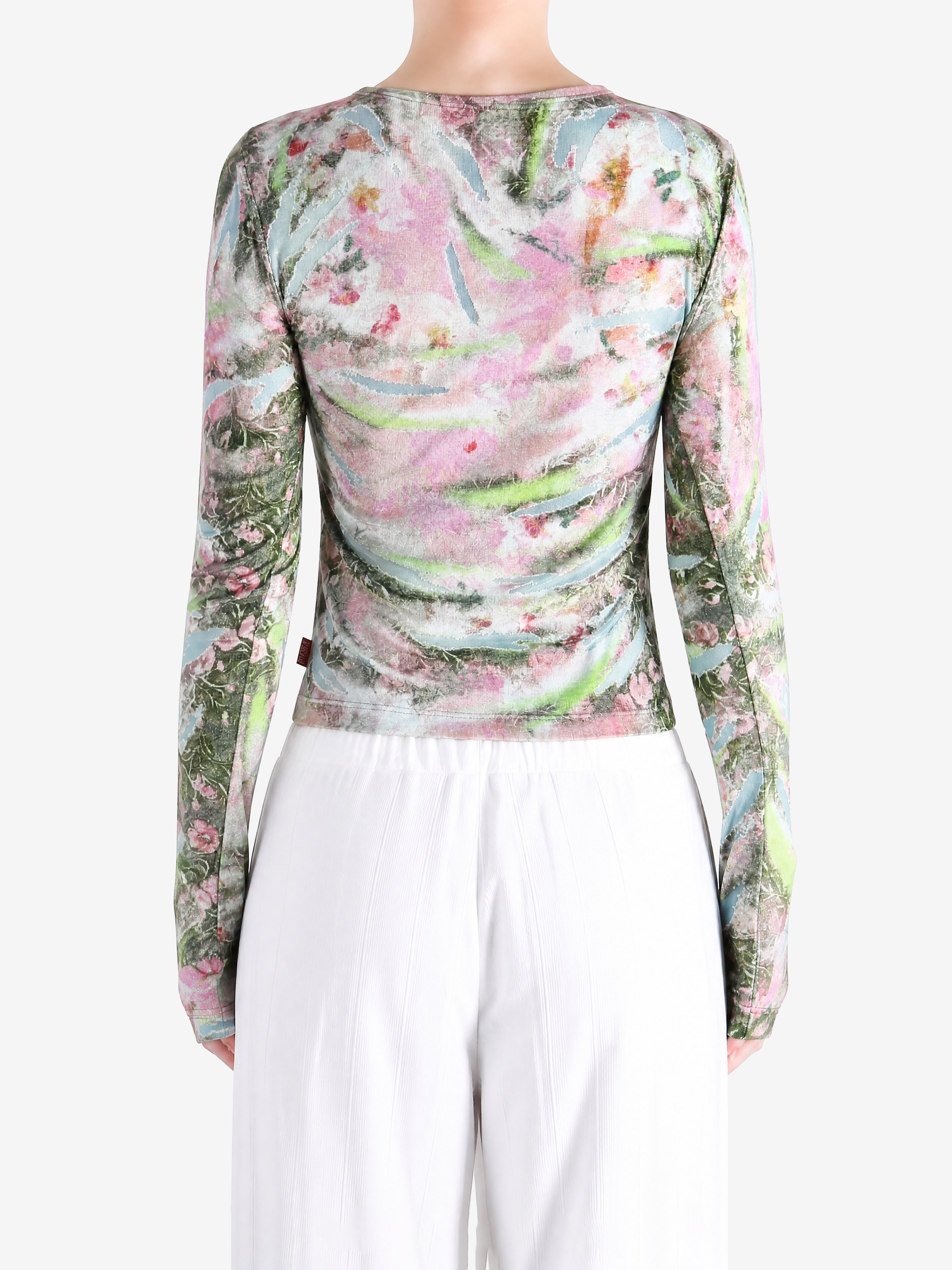 Pink top worn by a person, showing the top fit