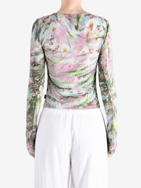 Pink top worn by a person, showing the top fit