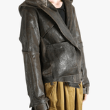 Black jacket worn by a person, showing the jacket's fit