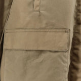 Close up of Tan jacket, showing texture of the 100% cotton fabric