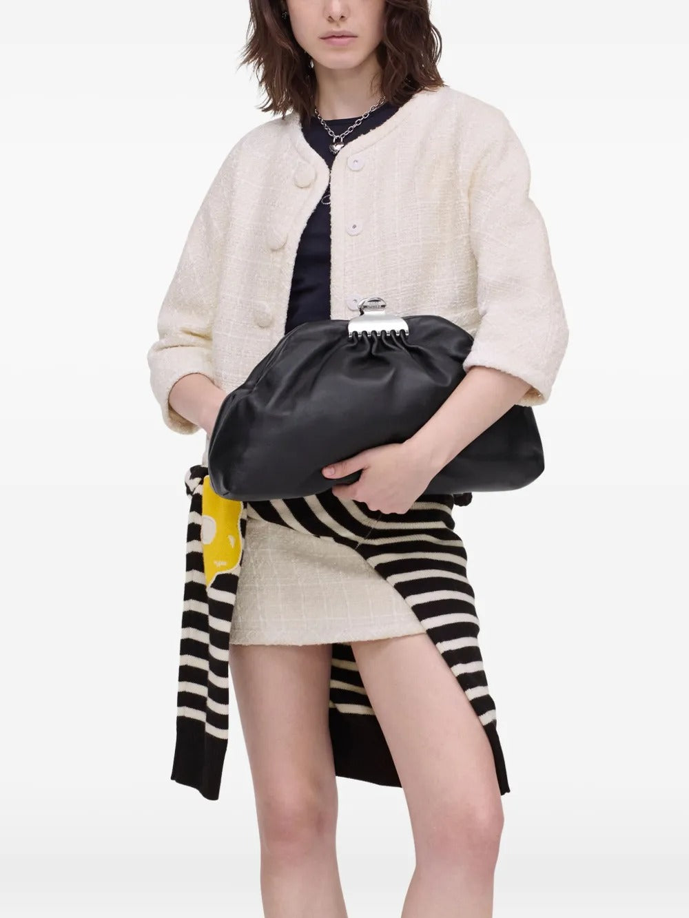 Black bags worn by a person, showing the bags fit