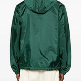 Green jackets worn by a person, showing the jackets fit