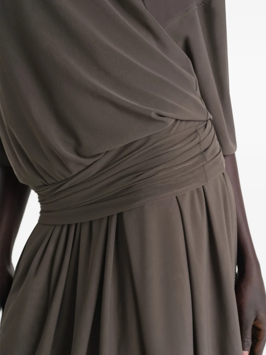 Close up of brown dresses, showing texture of the nylon fabric