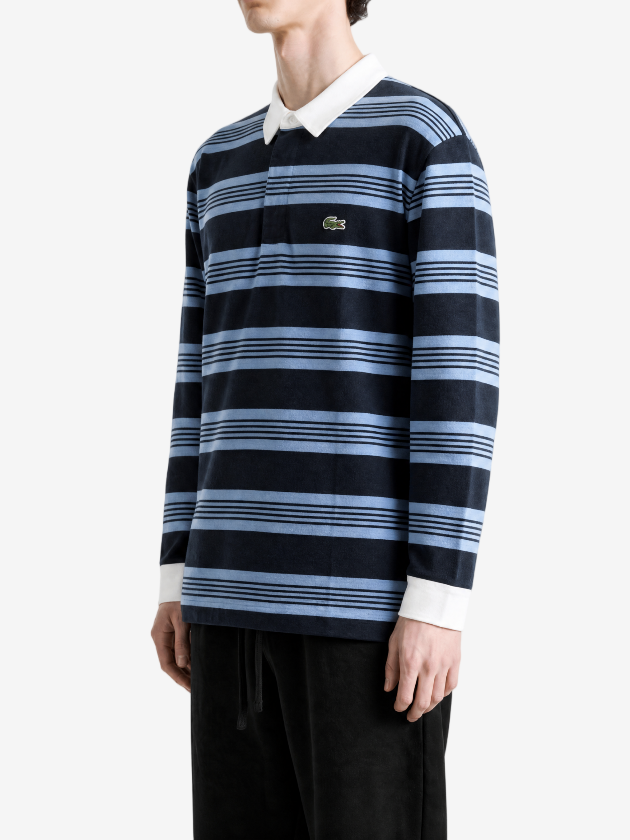 Navy shirt worn by a person, showing the shirt fit