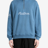 Blue hoodie worn by a person, showing the hoodie fit