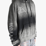 Gray hoodie worn by a person, showing the hoodie fit