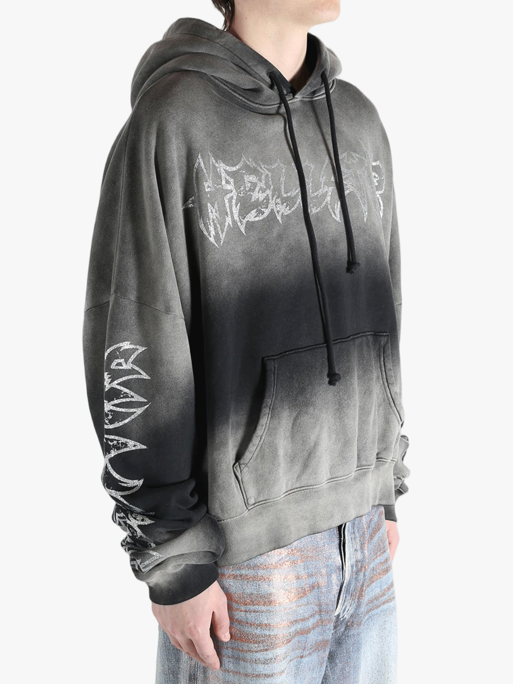 Gray hoodie worn by a person, showing the hoodie fit