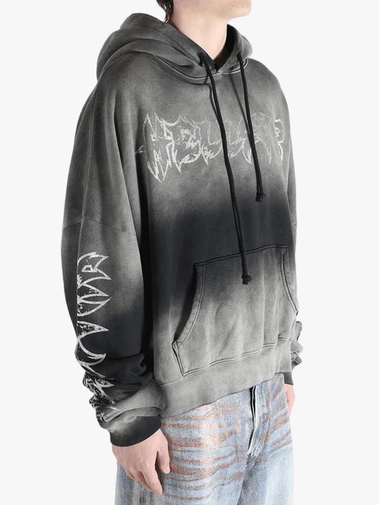 Gray hoodie worn by a person, showing the hoodie fit