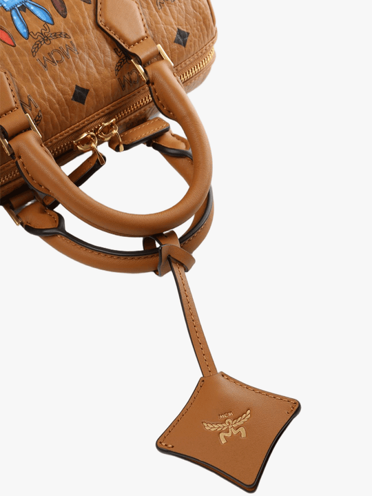 Close up of brown bag, showing texture of the fabric