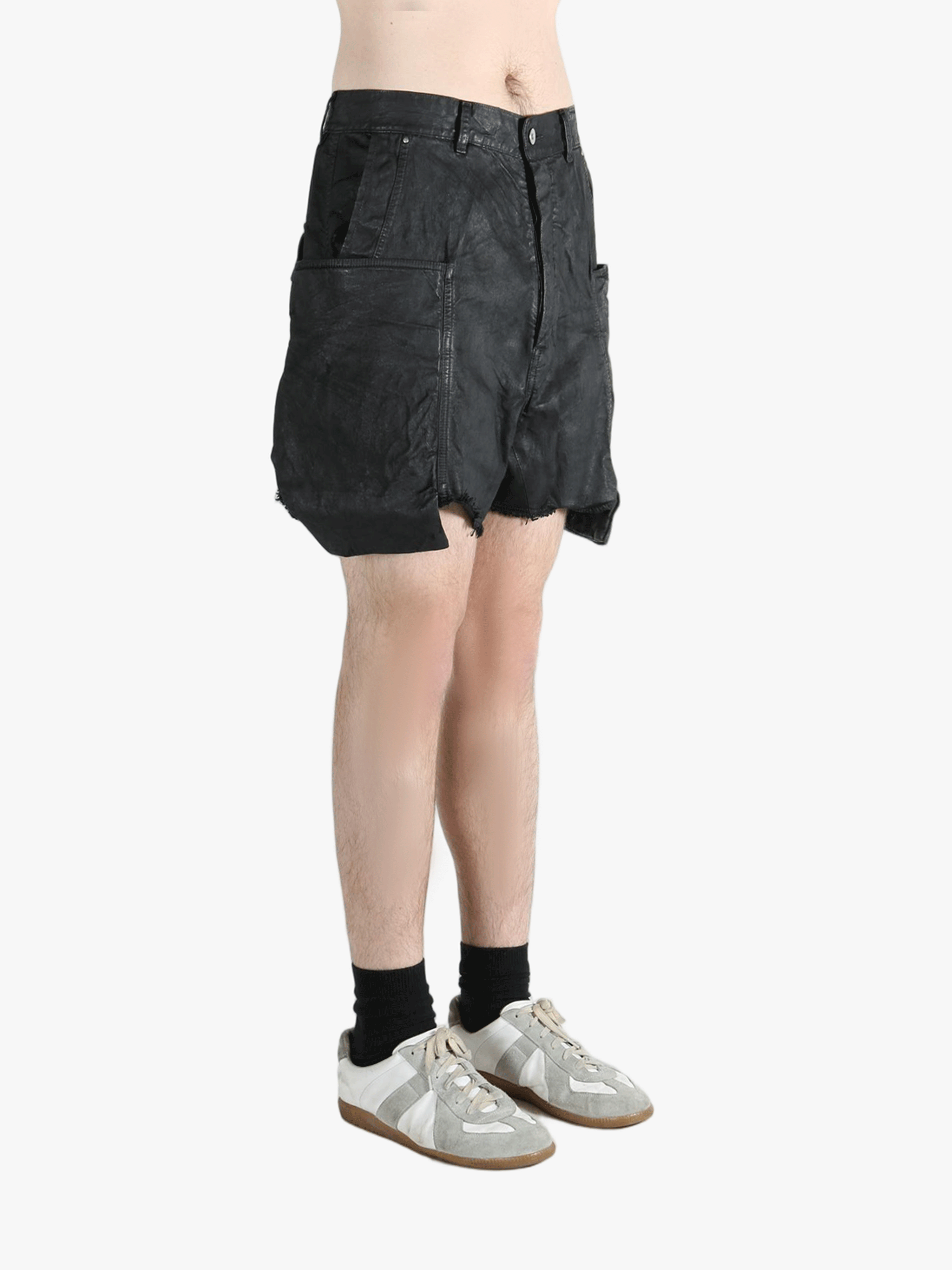 Black shorts worn by a person, showing the shorts fit