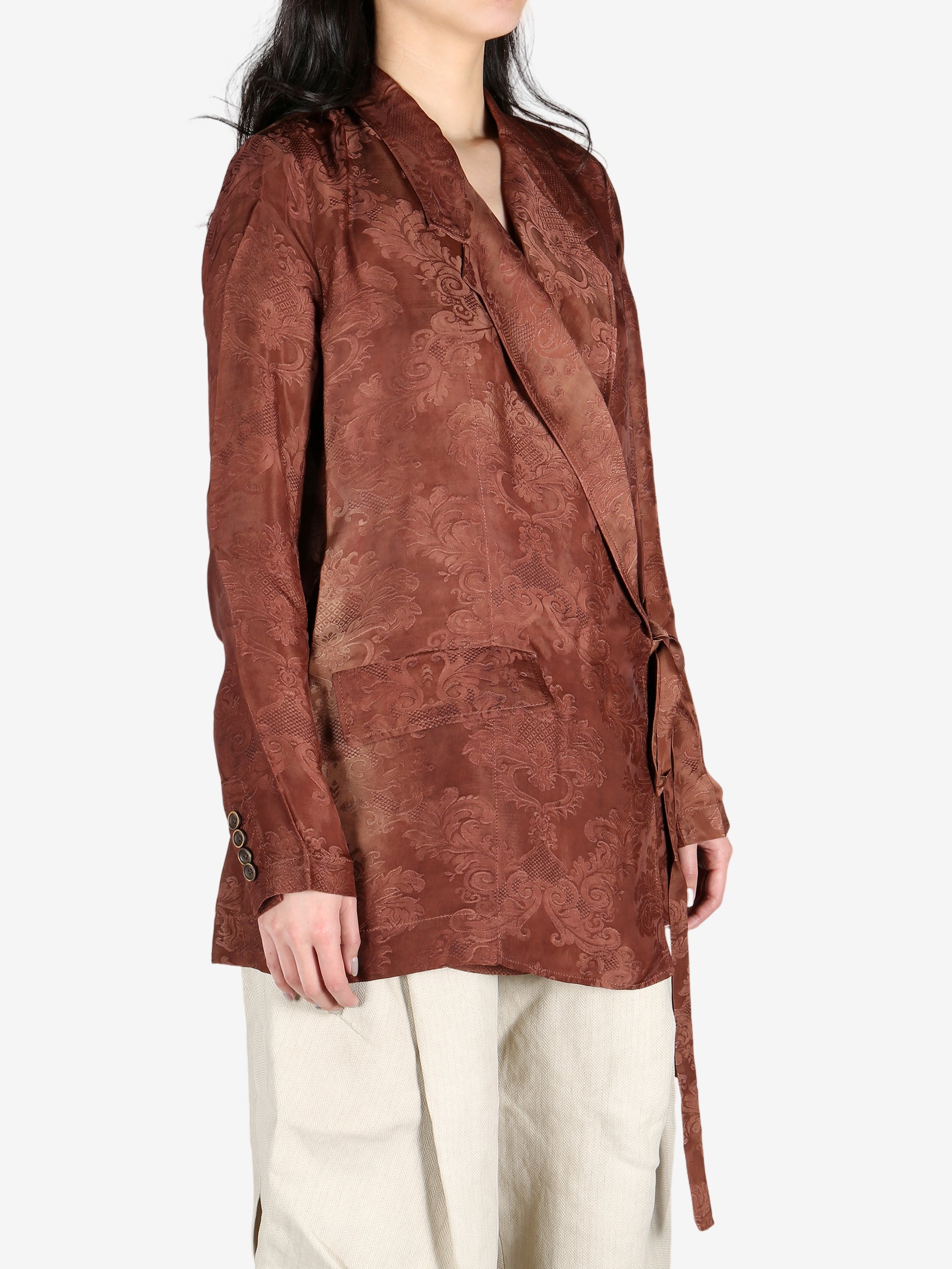 Red jacket worn by a person, showing the jacket's fit