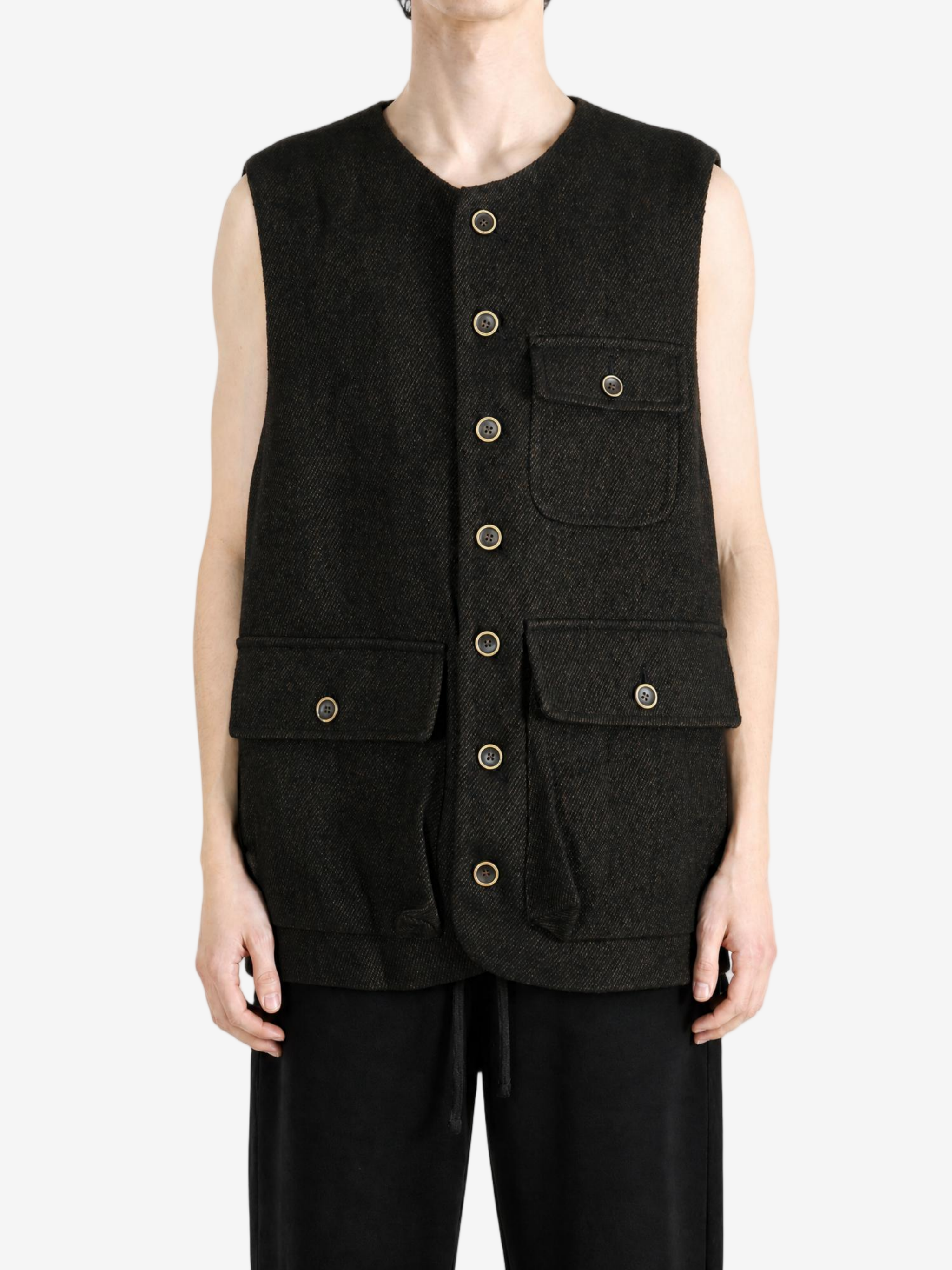 Black jacket worn by a person, showing the jacket fit