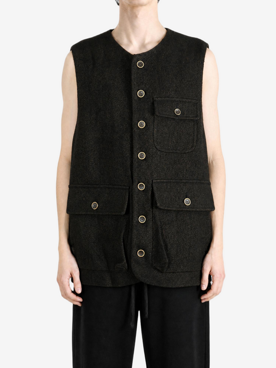 Black jacket worn by a person, showing the jacket fit