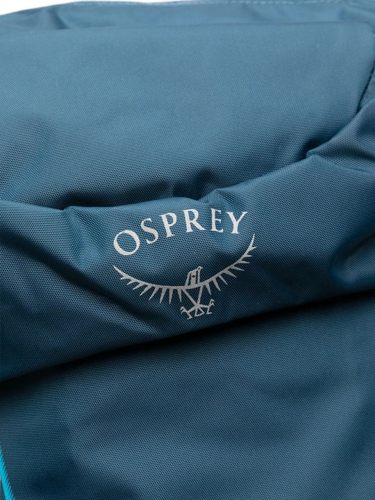 Close up of Blue bag, showing texture of the 100% recycled nylon made fabric
