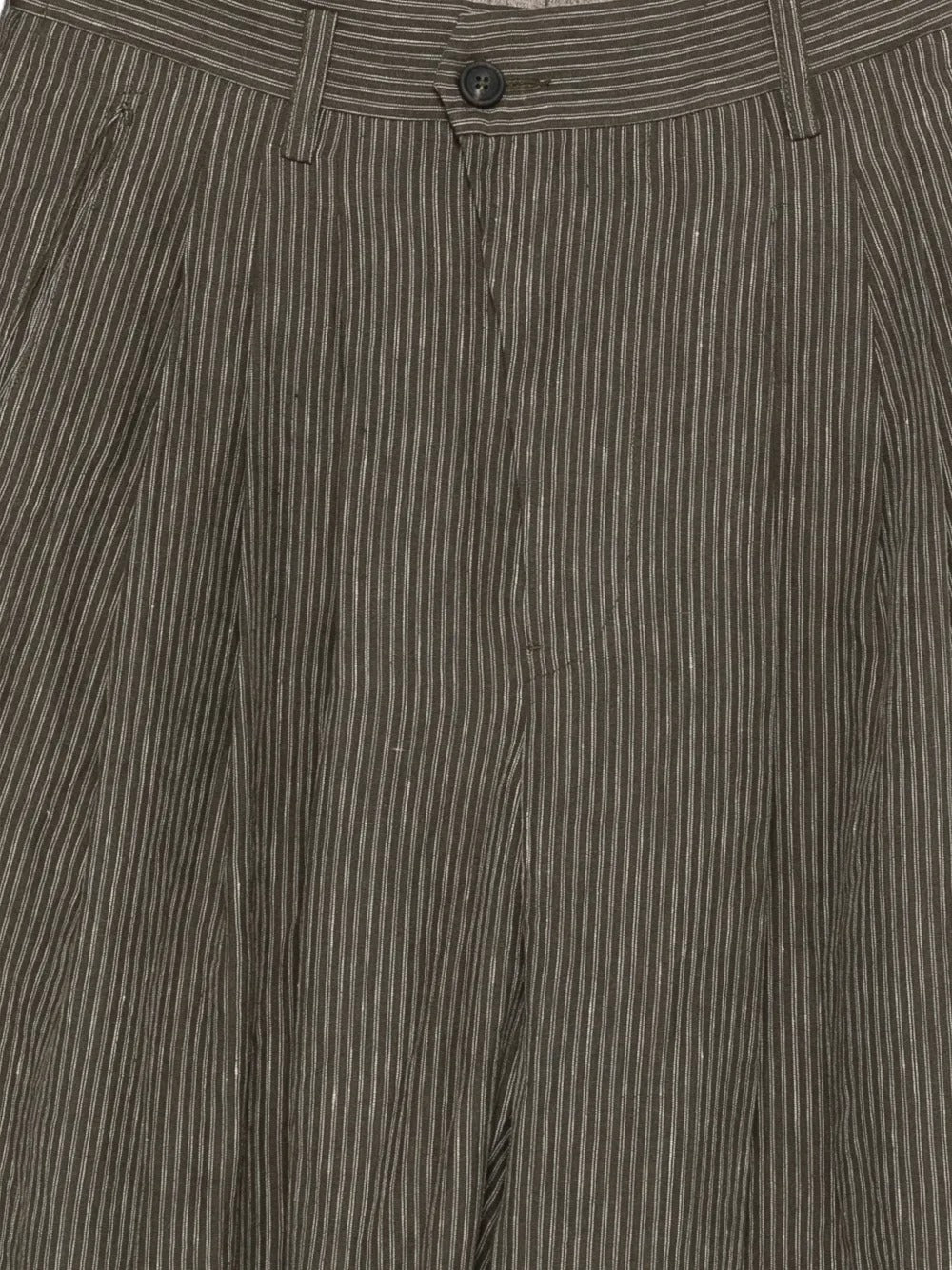 Close up of brown pants, showing texture of the linen fabric